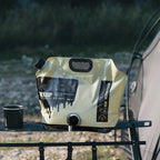 8L foldable water container beige version placed on camping table portable outdoor water storage bag