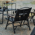 Rear view of the ShineTrip compact folding camping chair highlighting the storage pocket and tactical outdoor design.