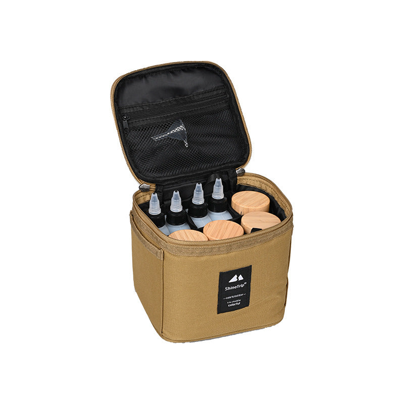 beige camping spice kit set with bottles and storage bag